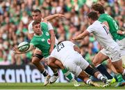 19 August 2023; Jack Crowley of Ireland is tackled by Freddie Steward and Ollie Lawrence of England during the Bank of Ireland Nations Series match between Ireland and England at Aviva Stadium in Dublin. Photo by Ramsey Cardy/Sportsfile
