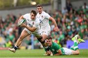 19 August 2023; Theo Dan of England is tackled by Garry Ringrose of Ireland during the Bank of Ireland Nations Series match between Ireland and England at Aviva Stadium in Dublin. Photo by Ramsey Cardy/Sportsfile
