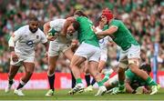 19 August 2023; Freddie Steward of England is tackled by Finlay Bealham of Ireland during the Bank of Ireland Nations Series match between Ireland and England at Aviva Stadium in Dublin. Photo by Ramsey Cardy/Sportsfile