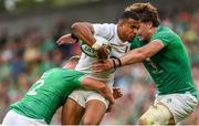 19 August 2023; Anthony Watson of England is tackled by Jack Crowley, left, and Cian Prendergast of Ireland during the Bank of Ireland Nations Series match between Ireland and England at Aviva Stadium in Dublin. Photo by Ramsey Cardy/Sportsfile