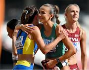 20 August 2023; Sharlene Mawdsley of Ireland, centre, is congratulatred by Kateryna Karpiuk of Ukraine after running a PB in the women's 400m heat during day two of the World Athletics Championships at National Athletics Centre in Budapest, Hungary. Photo by Sam Barnes/Sportsfile