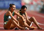20 August 2023; Sharlene Mawdsley of Ireland, left, after running a personal best in the women's 400m heat during day two of the World Athletics Championships at National Athletics Centre in Budapest, Hungary. Photo by Sam Barnes/Sportsfile