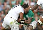 19 August 2023; Andrew Porter of Ireland is tackled by Billy Vunipola of England, for which Vunipola was issued a yellow card and the incident refereed to the TMO bunker which subsequently upgraded it to red, during the Bank of Ireland Nations Series match between Ireland and England at Aviva Stadium in Dublin. Photo by Brendan Moran/Sportsfile