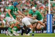 19 August 2023; Mack Hansen of Ireland in action against Jamie George of England during the Bank of Ireland Nations Series match between Ireland and England at Aviva Stadium in Dublin. Photo by Brendan Moran/Sportsfile