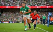 19 August 2023; James Lowe of Ireland on the way to scoring his side's third try during the Bank of Ireland Nations Series match between Ireland and England at Aviva Stadium in Dublin. Photo by Brendan Moran/Sportsfile