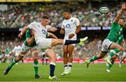 19 August 2023; Freddie Steward of England clears under pressure from James Ryan of Ireland during the Bank of Ireland Nations Series match between Ireland and England at Aviva Stadium in Dublin. Photo by Brendan Moran/Sportsfile