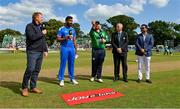 20 August 2023; Team captains Paul Stirling of Ireland and Jasprit Bumrah of India, alongside match referee Graham McCrea, second from right, and presenter Niall O'Brien, left, at the coin toss before match two of the Men's T20 International series between Ireland and India at Malahide Cricket Ground in Dublin. Photo by Seb Daly/Sportsfile