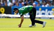 20 August 2023; Barry McCarthy of Ireland fields the ball during match two of the Men's T20 International series between Ireland and India at Malahide Cricket Ground in Dublin. Photo by Seb Daly/Sportsfile