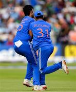 20 August 2023; Ruturaj Gaikwad of India, right, collides with teammate Shivam Dube, after catching out Ireland's Lorcan Tucker during match two of the Men's T20 International series between Ireland and India at Malahide Cricket Ground in Dublin. Photo by Seb Daly/Sportsfile