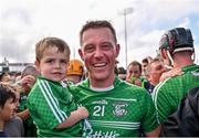 20 August 2023; Brendan Travers of Naomh Éanna celebrates with his son Ben, age 3, after victory in the Wexford County Senior Hurling Championship final match between Naomh Éanna and Oylegate-Glenbrien at Chadwicks Wexford Park in Wexford. Photo by Piaras Ó Mídheach/Sportsfile