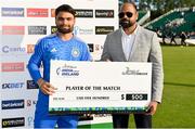 20 August 2023; Rinku Singh of India is presented with the Player of the Match award by Joy E-Bike vice president Sajid Malek after match two of the Men's T20 International series between Ireland and India at Malahide Cricket Ground in Dublin. Photo by Seb Daly/Sportsfile