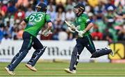 20 August 2023; Ireland batters Curtis Campher, right, and Andrew Balbirnie during match two of the Men's T20 International series between Ireland and India at Malahide Cricket Ground in Dublin. Photo by Seb Daly/Sportsfile