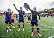 20 August 2023; St Patrick's Athletic players, from left, Mason Melia, Jay McGrath and Sam Curtis celebrate after the Sports Direct Men’s FAI Cup Second Round match between Derry City and St Patrick’s Athletic at The Ryan McBride Brandywell Stadium in Derry. Photo by Ben McShane/Sportsfile