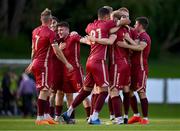 21 August 2023; Galway United players celebrate after Dave Hurley, hidden, scored their side's second goal during the Sports Direct Men’s FAI Cup Second Round match between UCD and Galway United at the UCD Bowl in Dublin. Photo by Ben McShane/Sportsfile