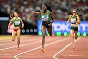 21 August 2023; Rhasidat Adeleke of Ireland crosses the finish line to qualify for the women's 400m final during day three of the World Athletics Championships at the National Athletics Centre in Budapest, Hungary. Photo by Sam Barnes/Sportsfile