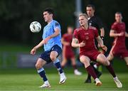 21 August 2023; Brendan Barr of UCD in action against Vince Borden of Galway United during the Sports Direct Men’s FAI Cup Second Round match between UCD and Galway United at the UCD Bowl in Dublin. Photo by Ben McShane/Sportsfile