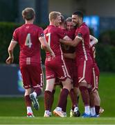 21 August 2023; Galway United players celebrate after their side's third goal, scored by Dave Hurley, centre, during the Sports Direct Men’s FAI Cup Second Round match between UCD and Galway United at the UCD Bowl in Dublin. Photo by Ben McShane/Sportsfile