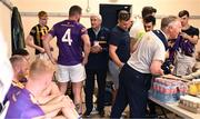 21 August 2023; Manager of Jim Bolger's Stars Liam Griffin in conversation with former Kilkenny hurler Jackie Tyrell, 4, in the dressing room before the Hurling for Cancer Research 2023 charity match at Netwatch Cullen Park in Carlow. Photo by Piaras Ó Mídheach/Sportsfile