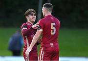 21 August 2023; Ronan Manning of Galway United celebrates with teammate Killian Brouder, right, after scoring their side's fourth goal during the Sports Direct Men’s FAI Cup Second Round match between UCD and Galway United at the UCD Bowl in Dublin. Photo by Ben McShane/Sportsfile