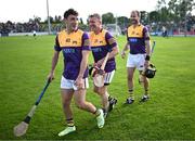 21 August 2023; Jim Bolger's Stars, from left, Kerry footballer Paudie Clifford, former Galway hurler Ollie Canning, and former Kilkenny hurler JJ Delaney in the parade before the Hurling for Cancer Research 2023 charity match at Netwatch Cullen Park in Carlow. Photo by Piaras Ó Mídheach/Sportsfile