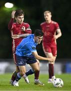 21 August 2023; Brendan Barr of UCD in action against Ronan Manning of Galway United during the Sports Direct Men’s FAI Cup Second Round match between UCD and Galway United at the UCD Bowl in Dublin. Photo by Ben McShane/Sportsfile