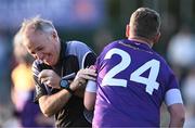 21 August 2023; Referee Dickie Murphy is tackled, off the ball, by former Galway hurler Ollie Canning of Jim Bolger's Stars during the Hurling for Cancer Research 2023 charity match at Netwatch Cullen Park in Carlow. Photo by Piaras Ó Mídheach/Sportsfile