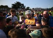 21 August 2023; Limerick hurler Cian Lynch of Jim Bolger's Stars signs autographs at the Hurling for Cancer Research 2023 charity match at Netwatch Cullen Park in Carlow. Photo by Piaras Ó Mídheach/Sportsfile