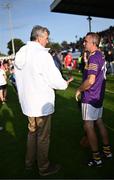 21 August 2023; Former Meath footballer and current Meath football manager Colm O'Rourke, left, with 1996 Wexford All-Ireland winning captain Martin Storey of Jim Bolger's Stars at the Hurling for Cancer Research 2023 charity match at Netwatch Cullen Park in Carlow. Photo by Piaras Ó Mídheach/Sportsfile