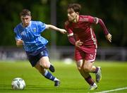 21 August 2023; Ronan Manning of Galway United in action against Donal Higgins of UCD during the Sports Direct Men’s FAI Cup Second Round match between UCD and Galway United at the UCD Bowl in Dublin. Photo by Ben McShane/Sportsfile