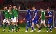 21 August 2023; Cork City players Ruairi Keating and Cian Coleman gesture to Roland Idowu of Waterford as he leaves the pitch after being shown a red card by referee Eoghan O'Shea during the Sports Direct Men’s FAI Cup Second Round match between Cork City and Waterford at Turner’s Cross in Cork. Photo by Eóin Noonan/Sportsfile