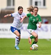 22 August 2023; Aishlinn Cotter of Republic of Ireland in action against Ranja Joensen of Faroe Islands during a women's U16 international friendly match between Republic of Ireland and Faroe Islands at Head in the Game Park in Drogheda, Louth. Photo by Ben McShane/Sportsfile