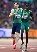 22 August 2023; Mark English of Ireland, left, crosses the finish line to place fourth in the men's 800m heats during day four of the World Athletics Championships at the National Athletics Centre in Budapest, Hungary. Photo by Sam Barnes/Sportsfile