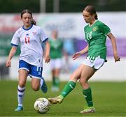 22 August 2023; Beatrice Silickaite of Republic of Ireland and Ranja Joensen of Faroe Islands during a women's U16 international friendly match between Republic of Ireland and Faroe Islands at Head in the Game Park in Drogheda, Louth. Photo by Ben McShane/Sportsfile