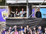 20 August 2023; TG4 commentators Diarmuid Lyng, left, and Brian Tyers with TG4 presenter Micheál Ó Domhnaill, right, during the Wexford County Senior Hurling Championship final match between Naomh Éanna and Oylegate-Glenbrien at Chadwicks Wexford Park in Wexford. Photo by Piaras Ó Mídheach/Sportsfile