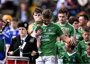 20 August 2023; Naomh Éanna captain Conor McDonald with his daughter Jude, age 7 months, in the pre-match parade before the Wexford County Senior Hurling Championship final match between Naomh Éanna and Oylegate-Glenbrien at Chadwicks Wexford Park in Wexford. Photo by Piaras Ó Mídheach/Sportsfile