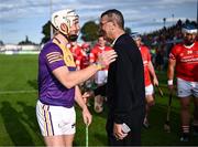 21 August 2023; Limerick hurler Cian Lynch with former Cork dual star and former Cork hurling manager Jimmy Barry Murphy at the Hurling for Cancer Research 2023 charity match at Netwatch Cullen Park in Carlow. Photo by Piaras Ó Mídheach/Sportsfile
