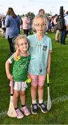 21 August 2023; Sister Aoife, age 4, and Róisín Marken, age 7, from Maynooth in Kildare at the Hurling for Cancer Research 2023 charity match at Netwatch Cullen Park in Carlow. Photo by Piaras Ó Mídheach/Sportsfile