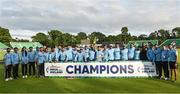 23 August 2023; India players and staff celebrate with the trophy after the abandonment of match three of the Men's T20 International series between Ireland and India at Malahide Cricket Ground in Dublin. Photo by Seb Daly/Sportsfile