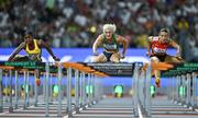 23 August 2023; Sarah Lavin of Ireland, centre, competes in the women's 100m hurdles during day five of the World Athletics Championships at the National Athletics Centre in Budapest, Hungary. Photo by Sam Barnes/Sportsfile