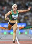 23 August 2023; Sarah Lavin of Ireland crosses the finish line to place fifth in the women's 100m hurdles during day five of the World Athletics Championships at the National Athletics Centre in Budapest, Hungary. Photo by Sam Barnes/Sportsfile