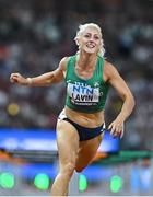 23 August 2023; Sarah Lavin of Ireland crosses the finish line to place fifth in the women's 100m hurdles heats during day five of the World Athletics Championships at the National Athletics Centre in Budapest, Hungary. Photo by Sam Barnes/Sportsfile