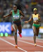 23 August 2023; Rhasidat Adeleke of Ireland, left, competes in the women's 400m during day five of the World Athletics Championships at the National Athletics Centre in Budapest, Hungary. Photo by Sam Barnes/Sportsfile