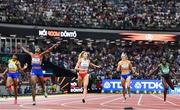 23 August 2023; Marileidy Paulino of Dominican Republic, second from left, celebrates after winning the women's 400m during day five of the World Athletics Championships at the National Athletics Centre in Budapest, Hungary. Photo by Sam Barnes/Sportsfile