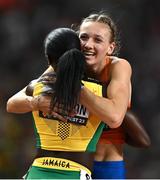 24 August 2023; Femke Bol of Netherlands, right, celebrates with bronze medallist Rushell Clayton of Jamaica, after winning the women's 400m hurdles final during day six of the World Athletics Championships at the National Athletics Centre in Budapest, Hungary. Photo by Sam Barnes/Sportsfile