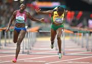 24 August 2023; Danielle Williams of Jamaica crosses the line, ahead of Nia Ali of United States, to win the women's 100m hurdles final during day six of the World Athletics Championships at the National Athletics Centre in Budapest, Hungary. Photo by Sam Barnes/Sportsfile