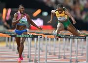 24 August 2023; Danielle Williams of Jamaica races ahead of Nia Ali of United States, on her way to winning the women's 100m hurdles final during day six of the World Athletics Championships at the National Athletics Centre in Budapest, Hungary. Photo by Sam Barnes/Sportsfile
