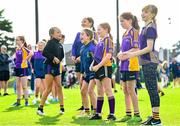 25 August 2023; Young Kilmacud Crokes players during a Notre Dame Football Clinic at Kilmacud Crokes GAA in Dublin, ahead of the Aer Lingus College Football Classic match between Notre Dame and Navy at the Aviva Stadium in Dublin. Photo by David Fitzgerald/Sportsfile