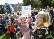 25 August 2023; Jen Sloane with her daughter Sloane, age 3, from Philadelphia at the Navy Pep Rally at Merrion Square, Dublin ahead of the Aer Lingus College Football Classic match between Notre Dame and Navy at the Aviva Stadium in Dublin. Photo by David Fitzgerald/Sportsfile