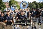 25 August 2023; Navy Spirit Band member Liza Galchenko, centre, at the Navy Pep Rally at Merrion Square, Dublin ahead of the Aer Lingus College Football Classic match between Notre Dame and Navy at the Aviva Stadium in Dublin. Photo by David Fitzgerald/Sportsfile