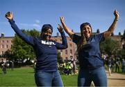 25 August 2023; Navy supporters Novelette Wallace and Tianni Brown from Miami at the Navy Pep Rally at Merrion Square, Dublin ahead of the Aer Lingus College Football Classic match between Notre Dame and Navy at the Aviva Stadium in Dublin. Photo by David Fitzgerald/Sportsfile